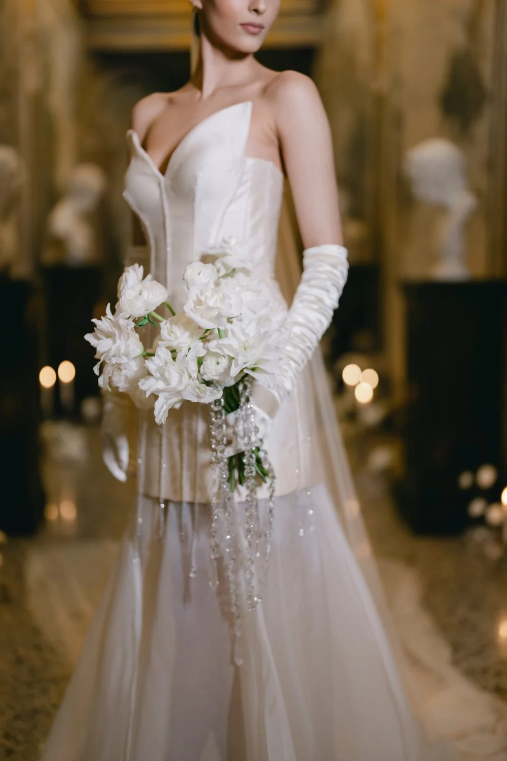 Ceremony backdrop of branches and seasonal blooms